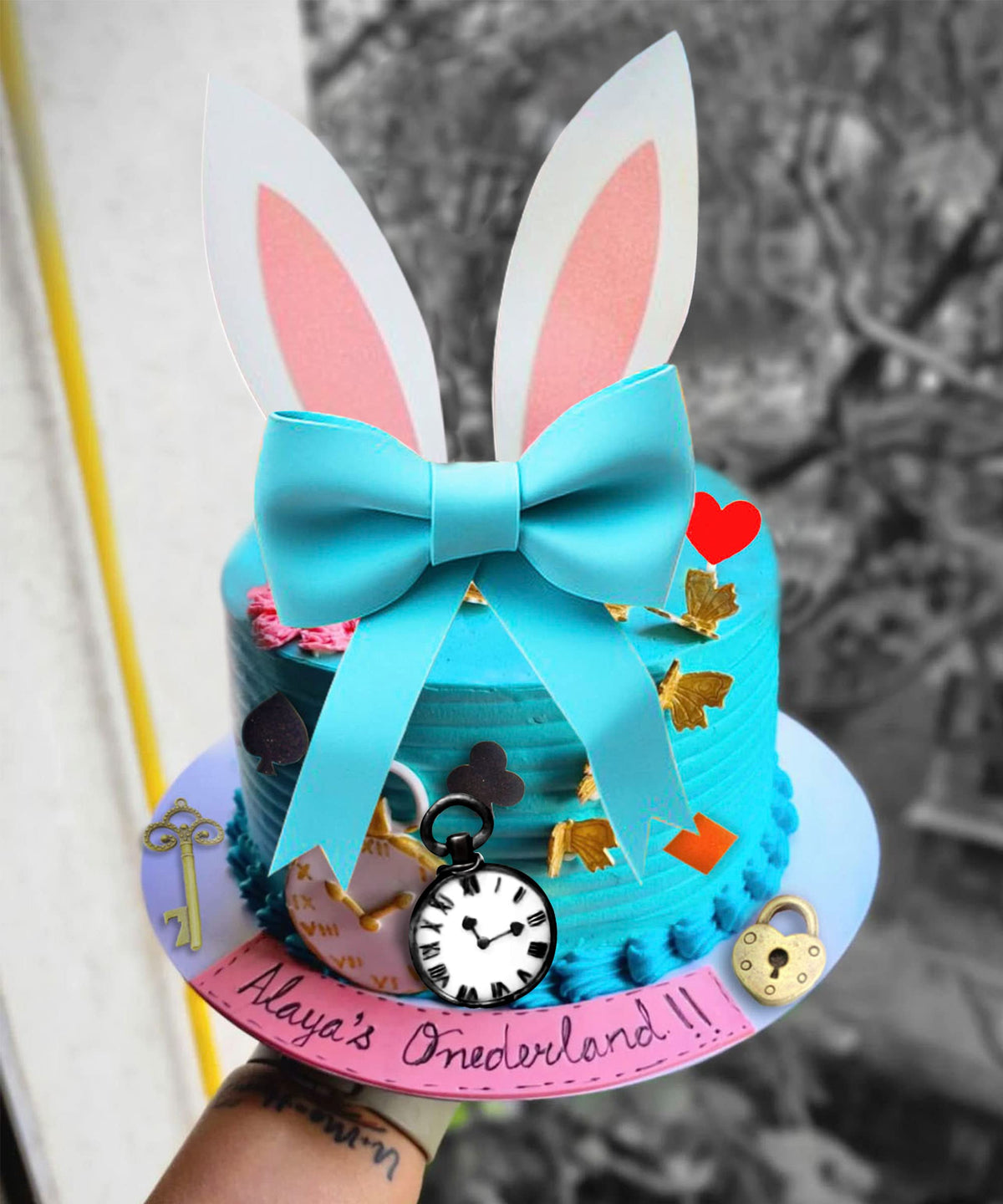 LaVenty Alice clock cake decor pair adds time-themed whimsy.