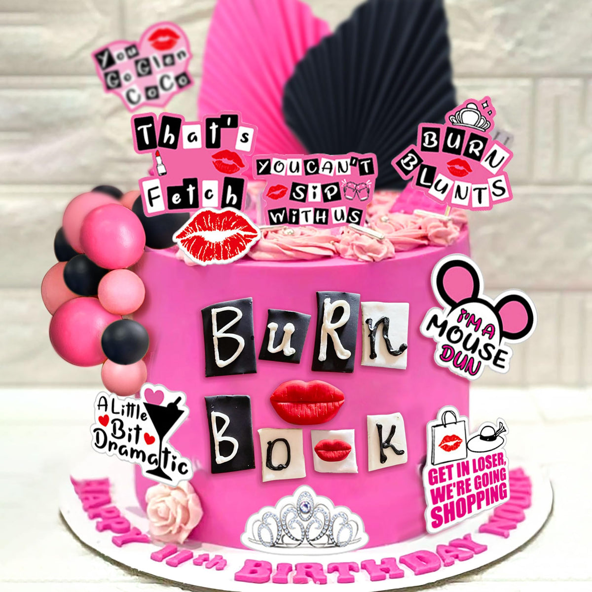 LaVenty Hot pink balls cake decorations energize dessert displays.