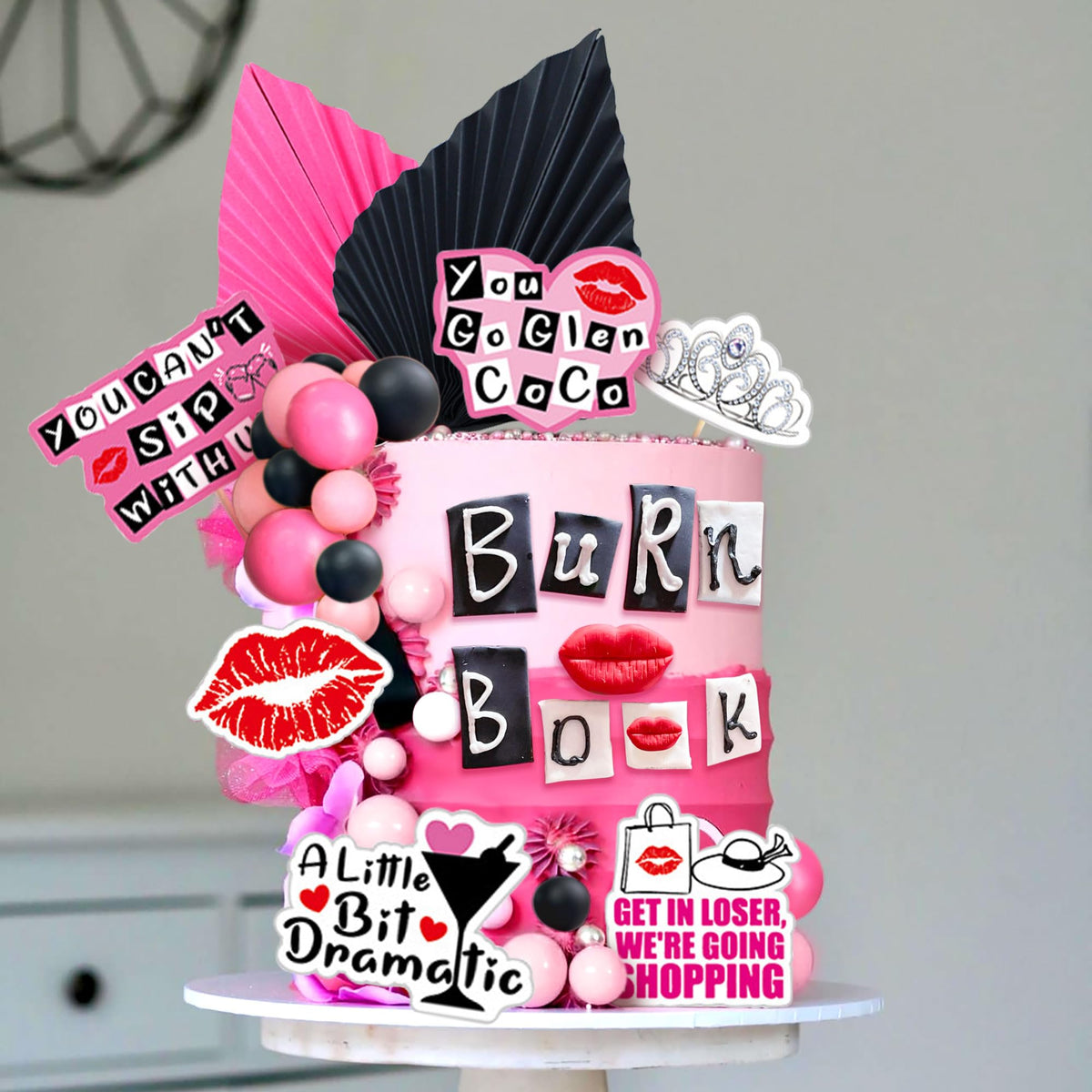 LaVenty Pink palm leaf cake decoration adds colorful tropical touch.