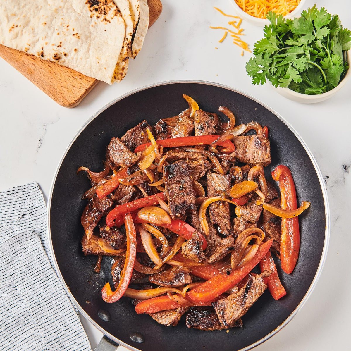 Lawry's fajitas spices sizzle pan for restaurant-style fajitas