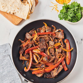Lawry's fajitas spices sizzle pan for restaurant-style fajitas