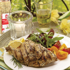 Lawry's Garlic Rosemary Lemon Rub on salmon before grilling