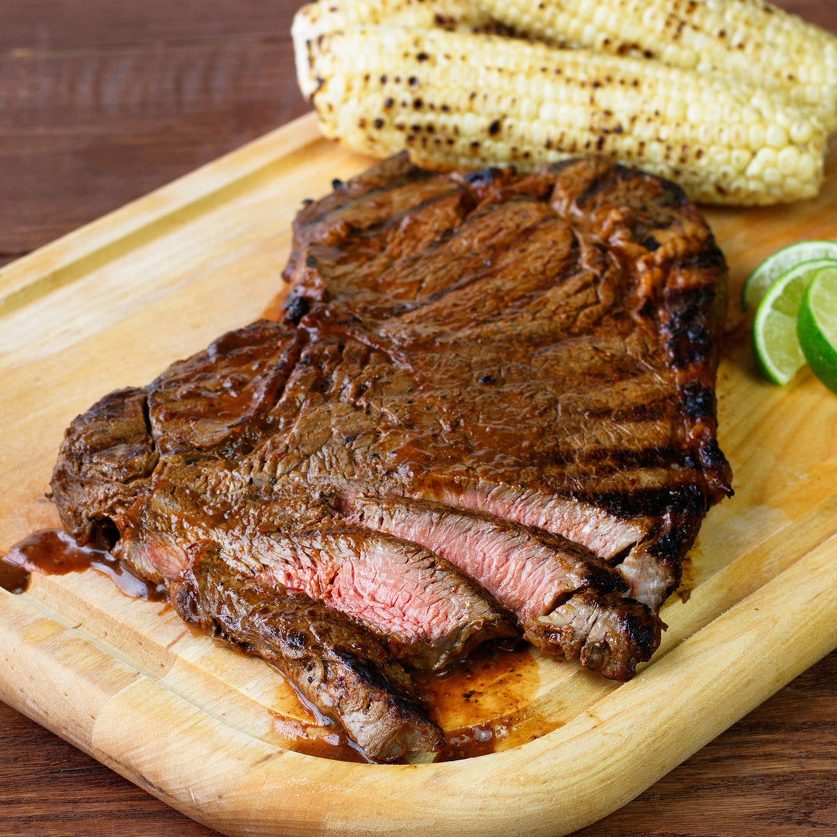 Lawry's Mesquite with Lime Marinade fajitas sizzling on a grill