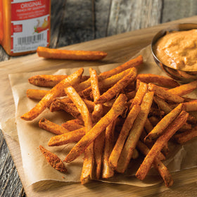 Lawry's Original French Fry Seasoning in a kitchen scene ready for batch prep