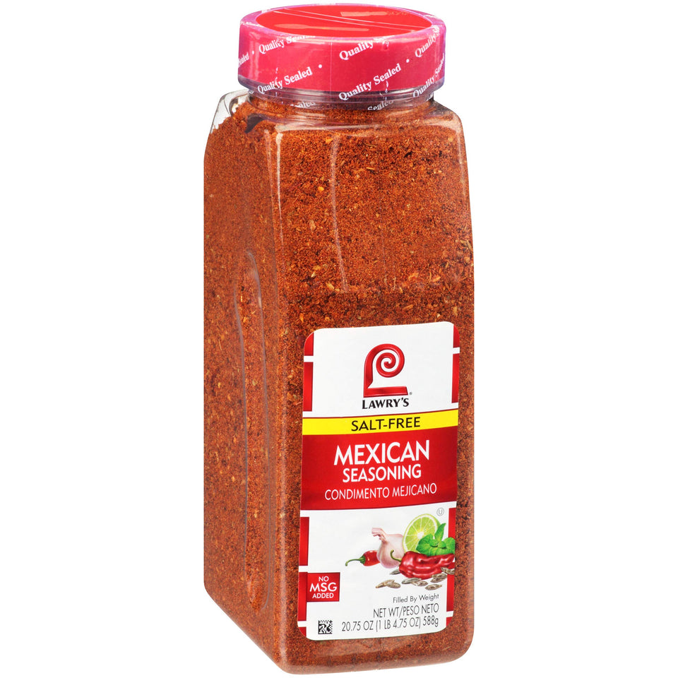 Lawry's Salt-Free Mexican Seasoning bottle pour, ideal for fajitas and healthier meals.