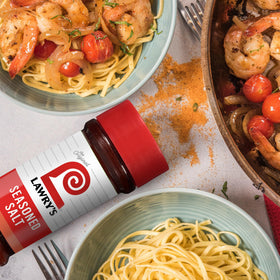 Lawry's Seasoned Salt sprinkled on steak for searing.