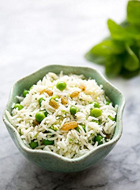 Laxmi Lower GI Basmati rice ready to serve with herbs for comforting stews.