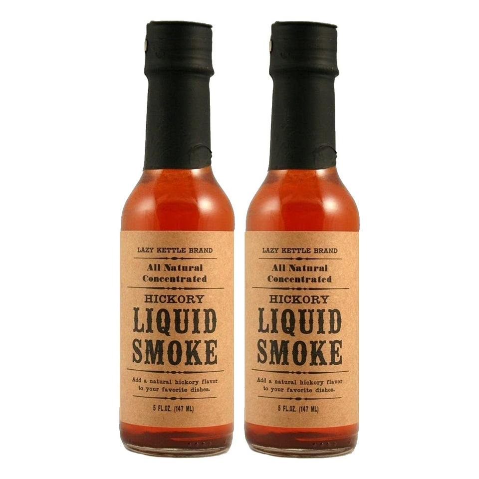 Lazy Kettle Liquid Smoke bottle pour showcases rich hickory flavor for grilling.