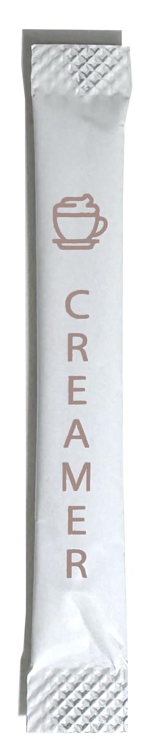 Le Must non-dairy creamer packets arranged in a row for quick, single-serve coffee enhancement.