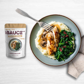 Le Sauce & Co Velvet gravy in a bowl with mushrooms for depth and aroma.