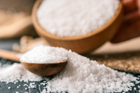 Close-up shows delicate salt crystals ideal for finishing fish or vegetables.