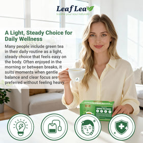 LeafLea green tea brew steeping in a cup with a pale green color.