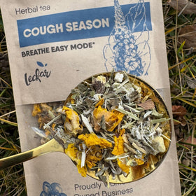 Brewing Leckar Cough Season tea in a cup for comfort.