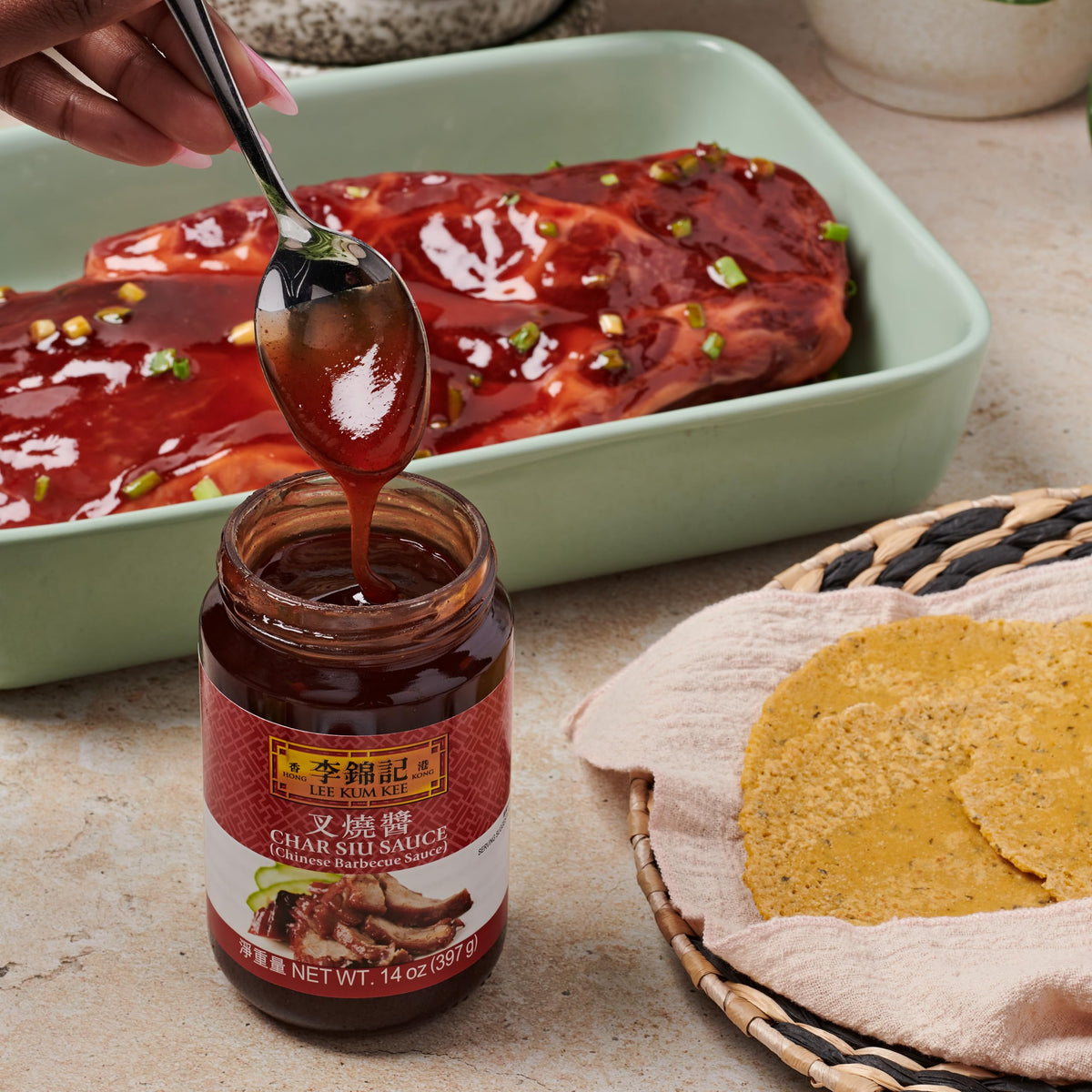 Lee Kum Kee Char Siu Sauce sizzle as a marinade during grilling.