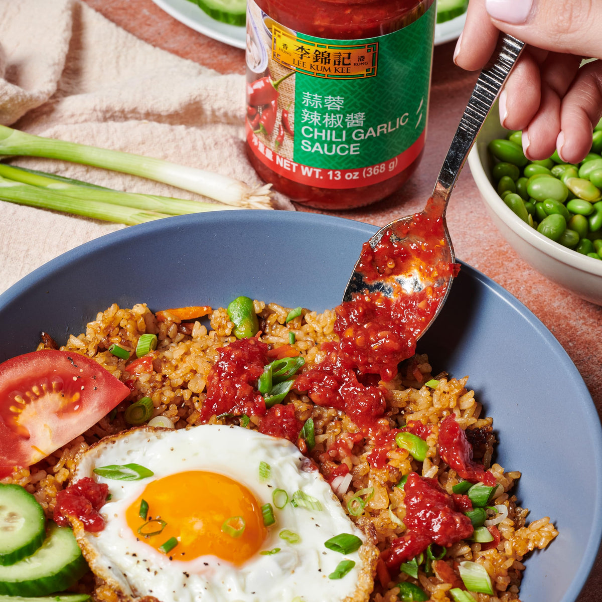 Lee Kum Kee Chili Garlic Sauce tossed with fried rice for extra heat