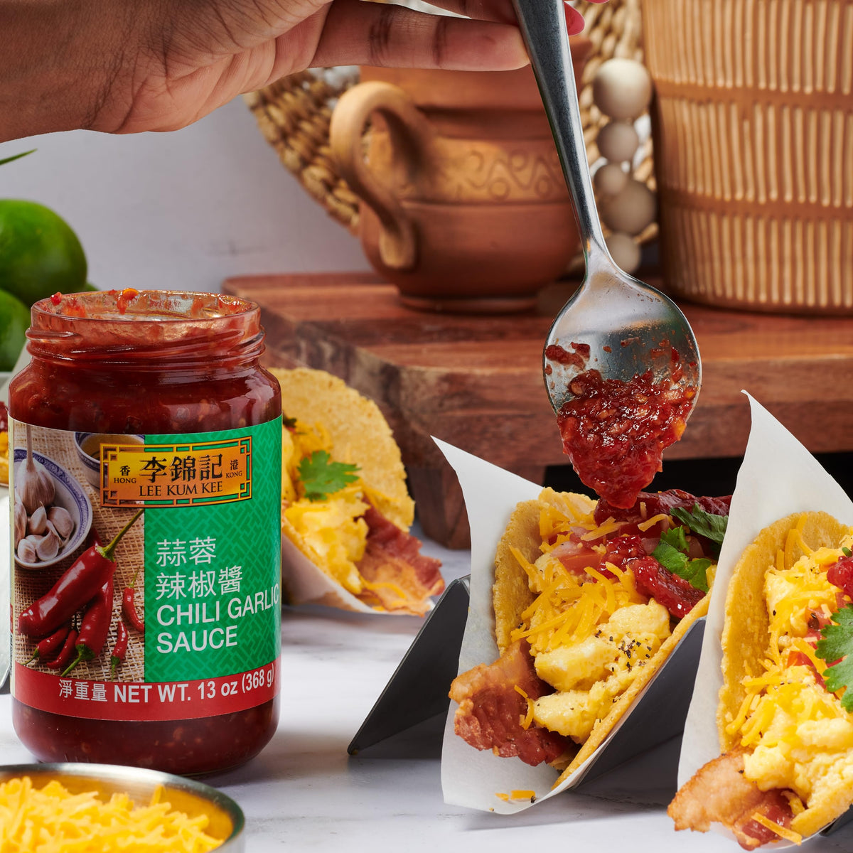 Lee Kum Kee Chili Garlic Sauce with shrimp cooking in a pan