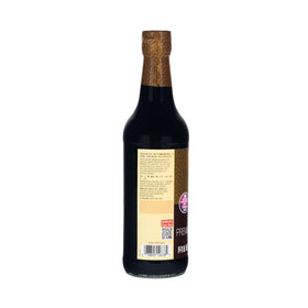 Lee Kum Kee Premium Dark Soy Sauce enhances stir-fry noodles with glossy finish