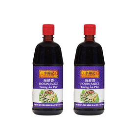 Lee Kum Kee Hoisin Sauce bottle pouring for a glossy glaze on noodles