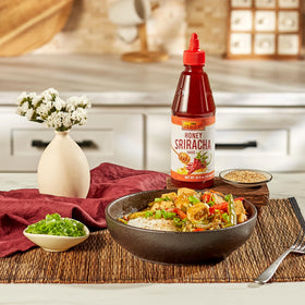 Stir-fry pan ready with glossy honey-sriracha coating.