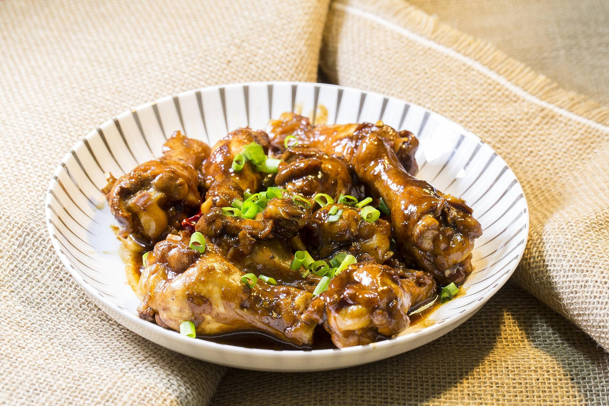 Lee Kum Kee LKK Premium Dark Soy Sauce pours smoothly, adding depth to stir-fries and braises.