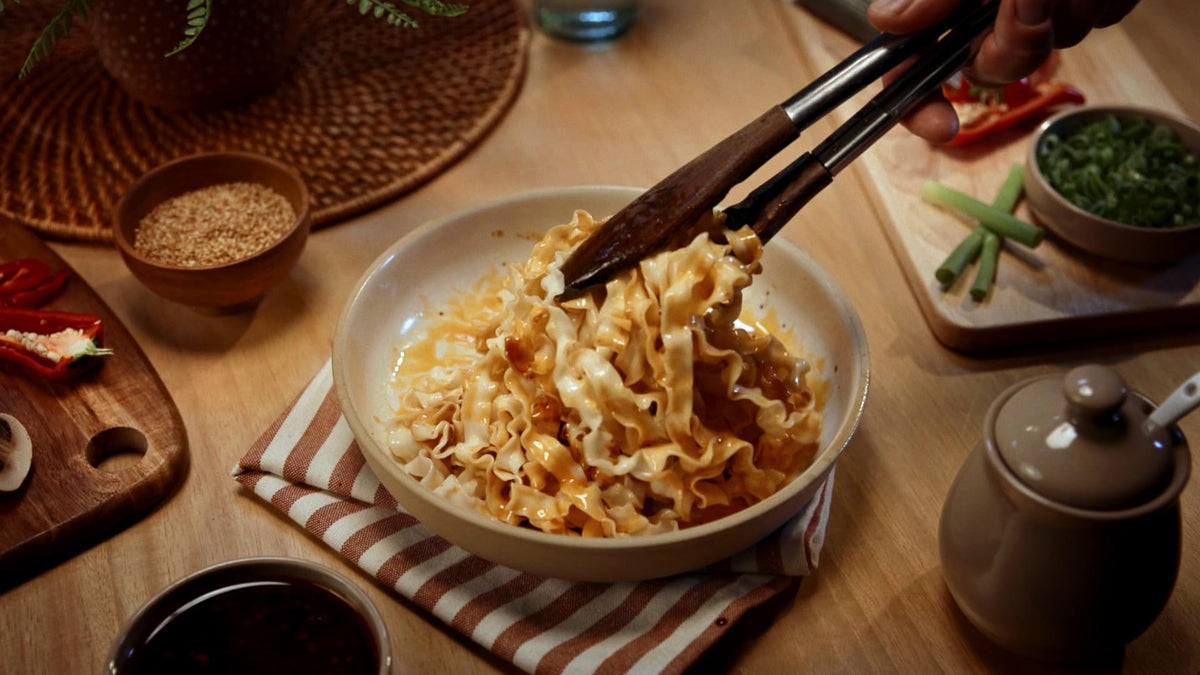 Lee Kum Kee noodles in a bowl with toppings, ready in minutes.