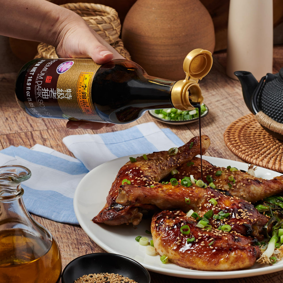 Glossy bottle finish catches light during cooking sessions