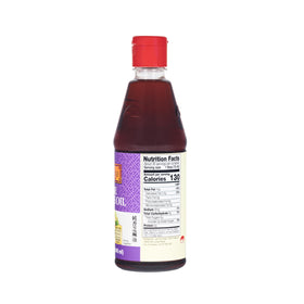 Lee Kum Kee Pure Sesame Oil 2-pack bottle side view in kitchen
