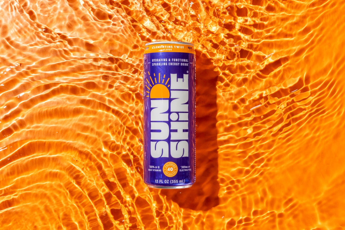 Legendary Sunshine Clementine Twist sparkling bubbles close-up, crisp low-calorie pick-me-up