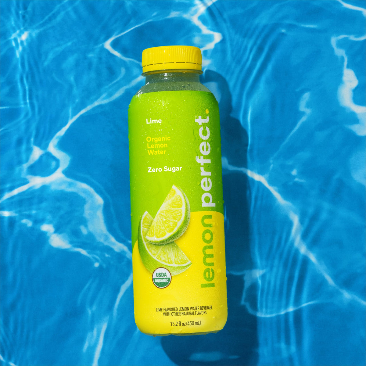 Lemon Perfect Lime bottle-pour into glass shows zero sugar and tasty hydration.