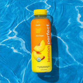 Lemon Perfect Peach 12-pack packaging front emphasizing recyclable bottles