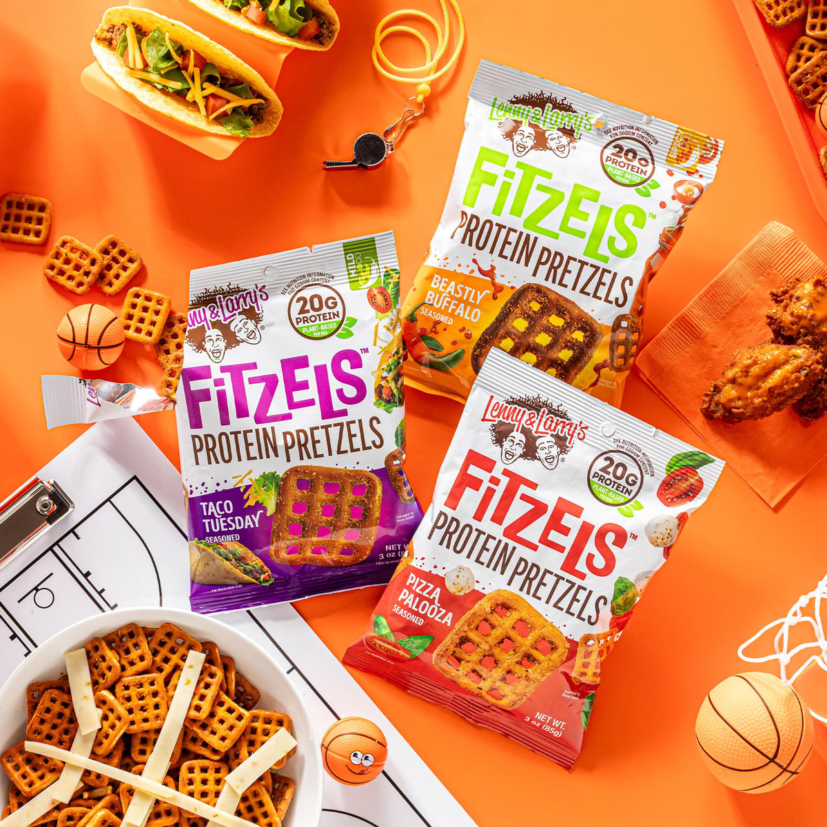 Lenny & Larry's FITZELS taco flavor pack shot with zesty crunch.