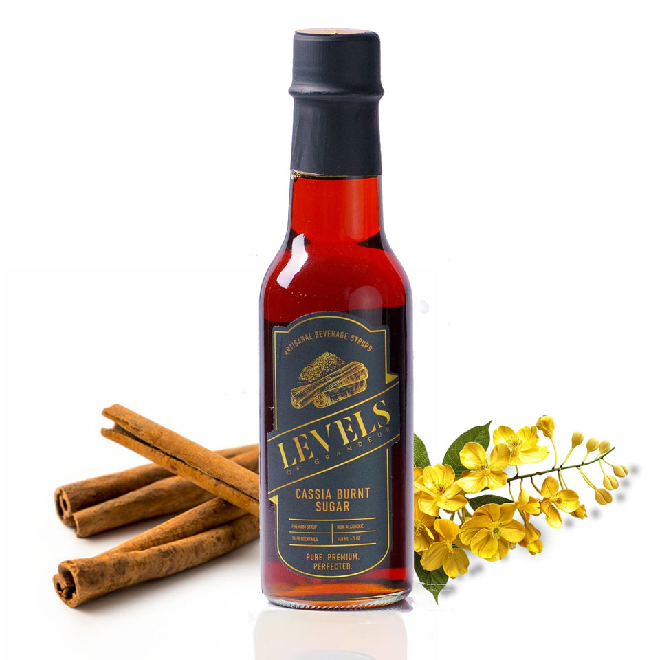Levels of Grandeur Cassia Cinnamon Burnt Sugar Syrup bottle pour adds warm spice to cocktails.