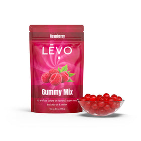 LEVO Gummy Mix Raspberry dry mix close-up showcases natural flavors for easy, customizable edibles.