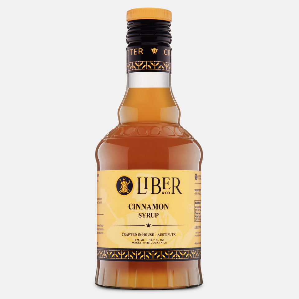 Liber & Co. Cinnamon Syrup bottle closeup showing rich color for cocktails and coffee