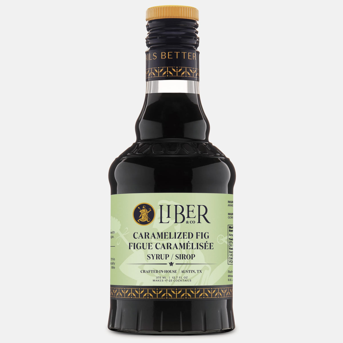 Liber & Co cocktail glass with fig syrup drizzle, ready for craft mixing