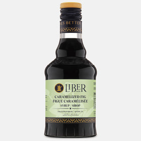 Liber & Co cocktail glass with fig syrup drizzle, ready for craft mixing