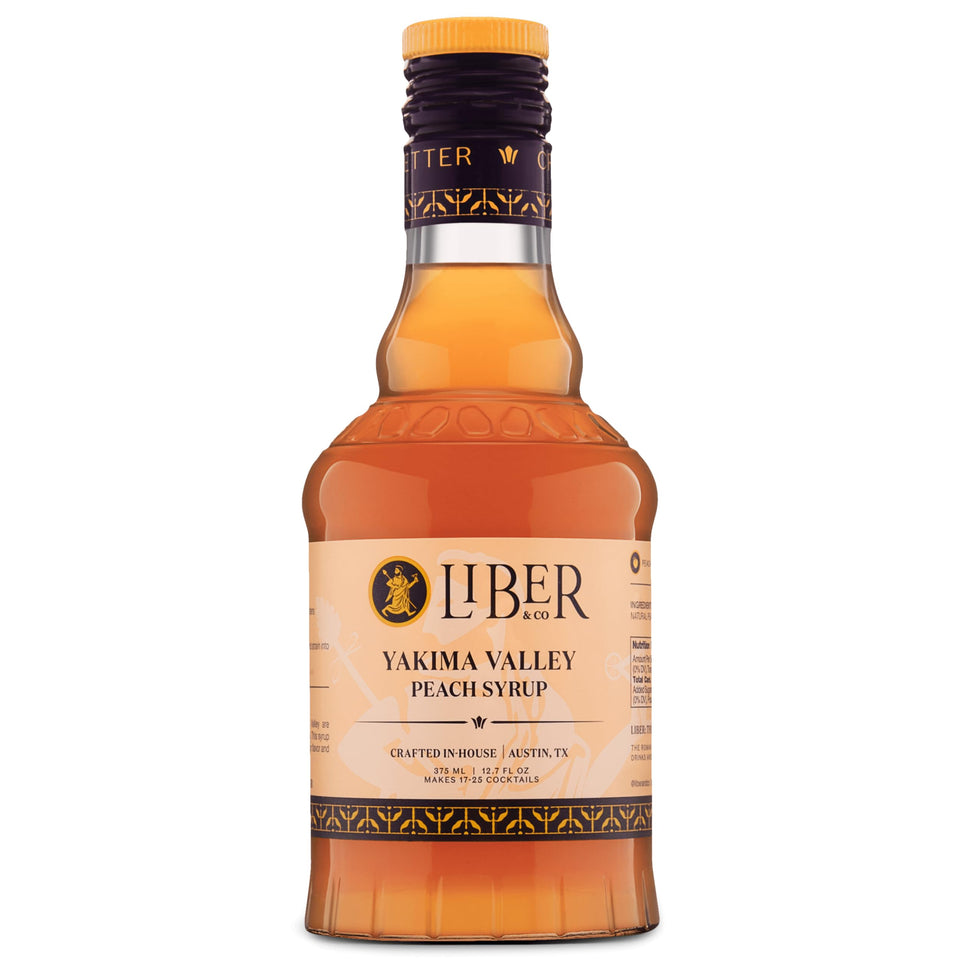 Liber & Co. Peach Syrup bottle showcases 60% peach juice for cocktails.