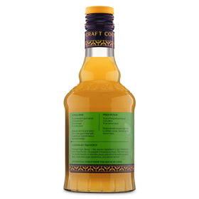 Pineapple-based cocktails served with Liber & Co syrup at bar
