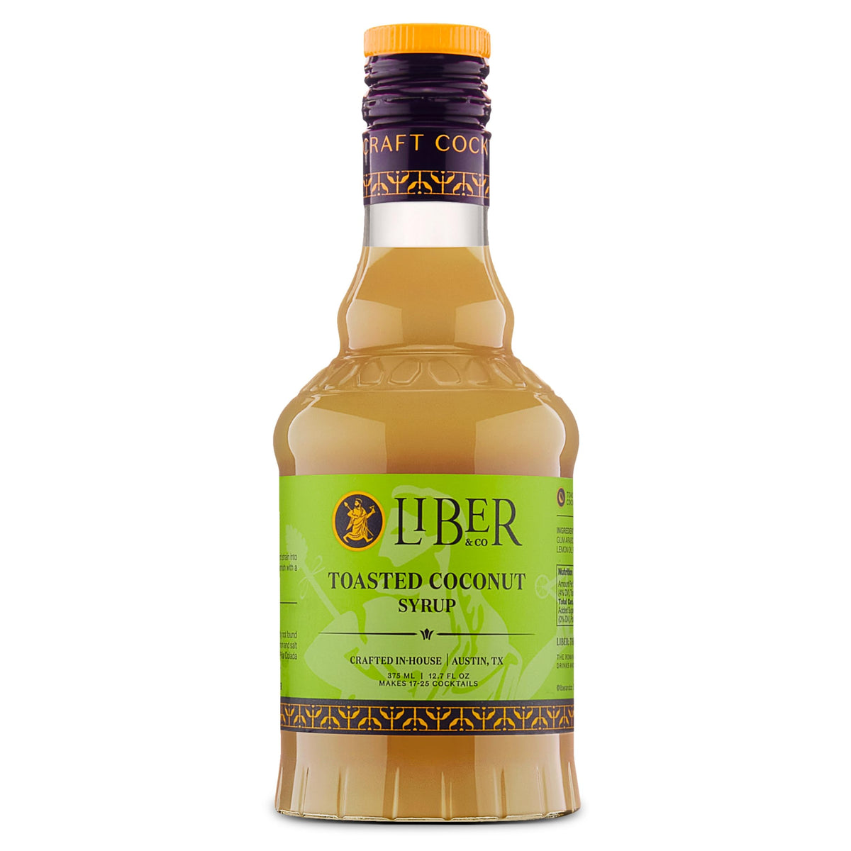 Liber & Co. Toasted Coconut Syrup bottle on bar setup for tropical cocktails