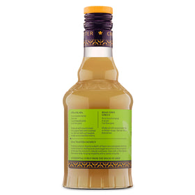 Liber & Co. Toasted Coconut Syrup pouring over dessert to glaze tropical flavor