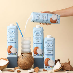 Real Coco coconut milk glass with rich pour for desserts and cups.