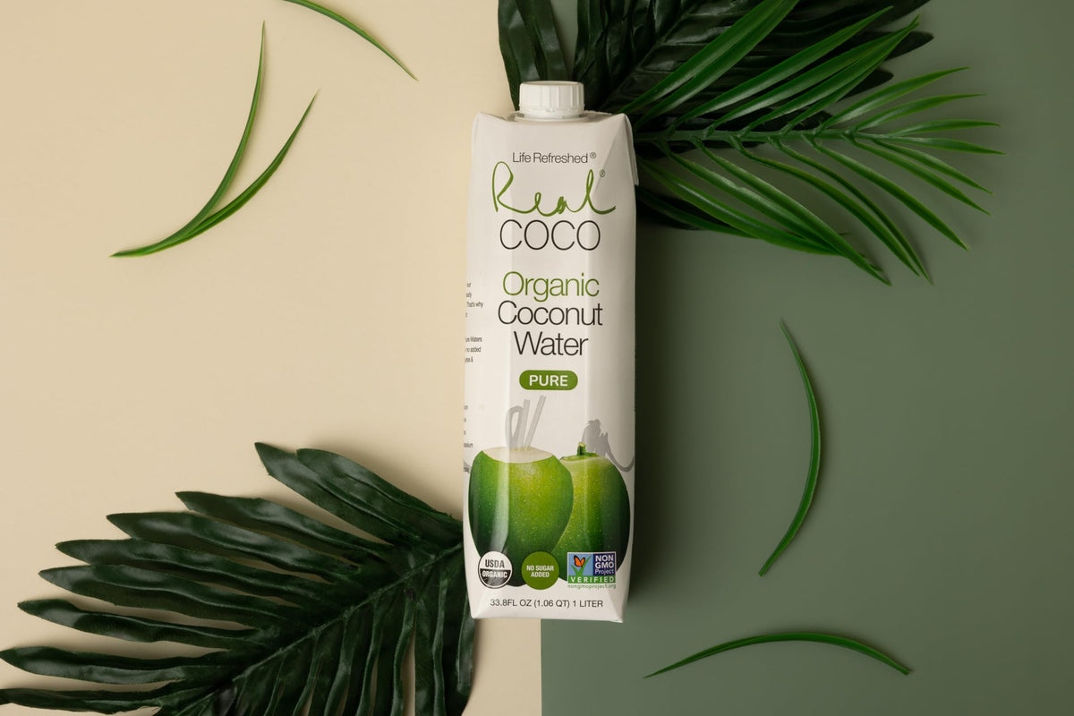 Life Refreshed Real Coco coconut water 1L bottle label shows organic ingredients.