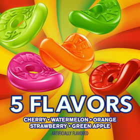 Life Savers Gummies on a beach blanket offer a refreshing outdoor snack.