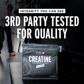 LifeAID FITAID creatine powder being mixed with water for easy use.