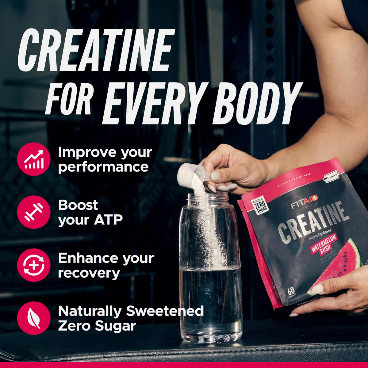 Scoop of FITAID Creatine Watermelon Rush powder ready to mix.
