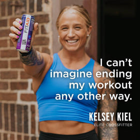 Chilled FITAID Energy Grape Acai can on a gym bench mid-workout.