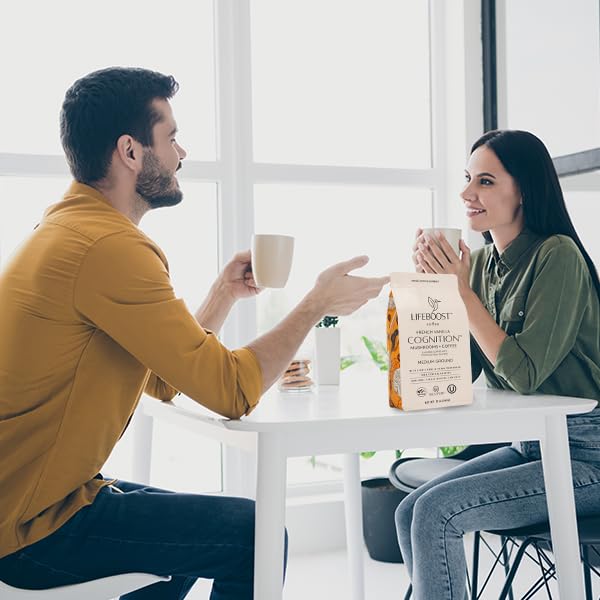 Lifeboost coffee cup with spoon ready for a mindful morning