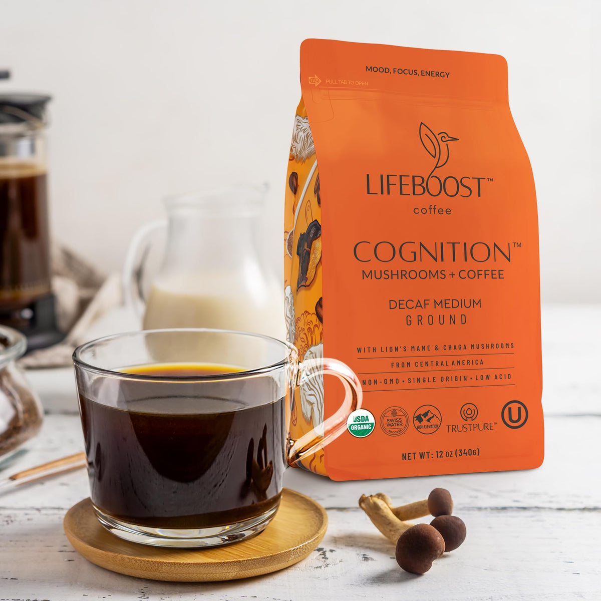 Lifeboost Cognition coffee bag beside a cup suggesting a mindful daily routine.