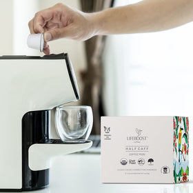 Mold-free design highlighted on Lifeboost Half Caff packaging.
