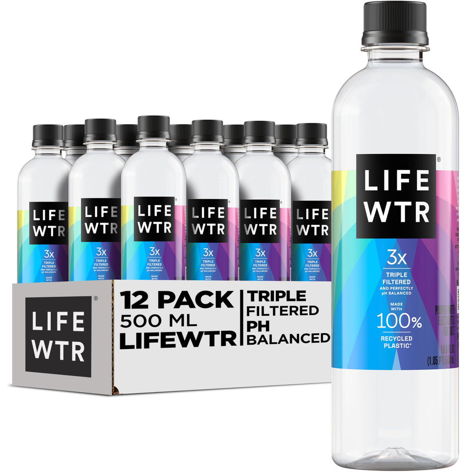 LIFEWTR bottle pouring shows crisp, purified water with electrolytes for taste.